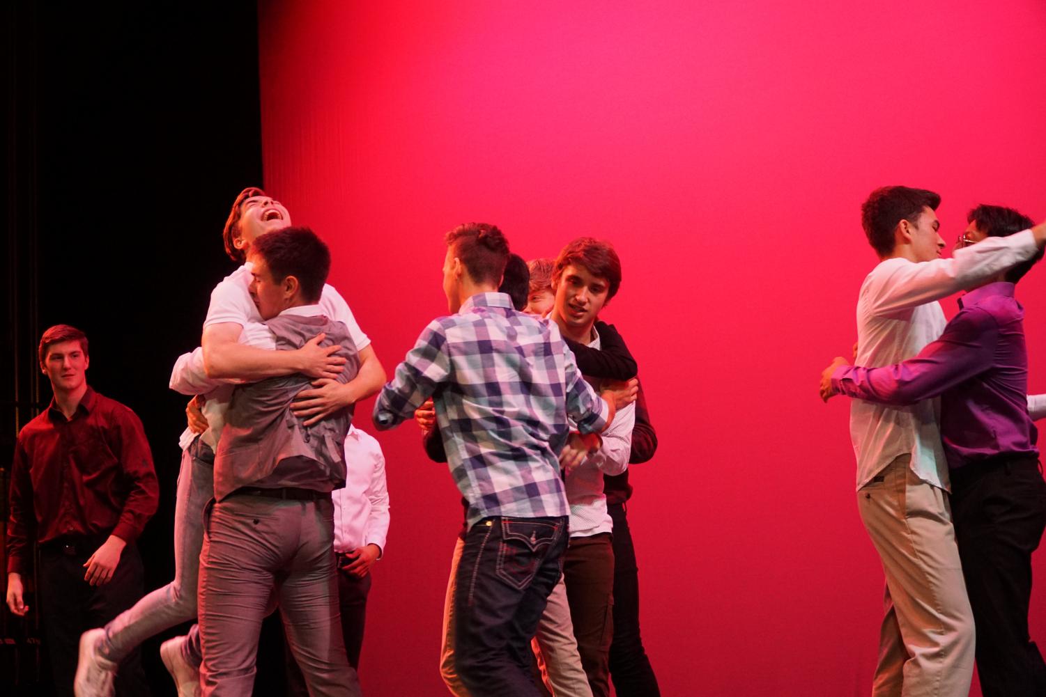 In this photo taken by Shorecrest student David Pike, the Mr. Shorecrest contestants rejoiced after their successful show. They congratulate each other after a long night of performances as possibly the last Mr. Shorecrest comes to an end.