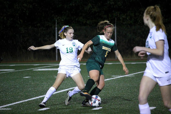 Senior captain Laura Hoover steals the ball from an opponent. 