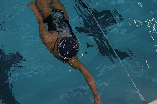 A Shorecrest swimmer competes hard at the Shoreline Pool. 