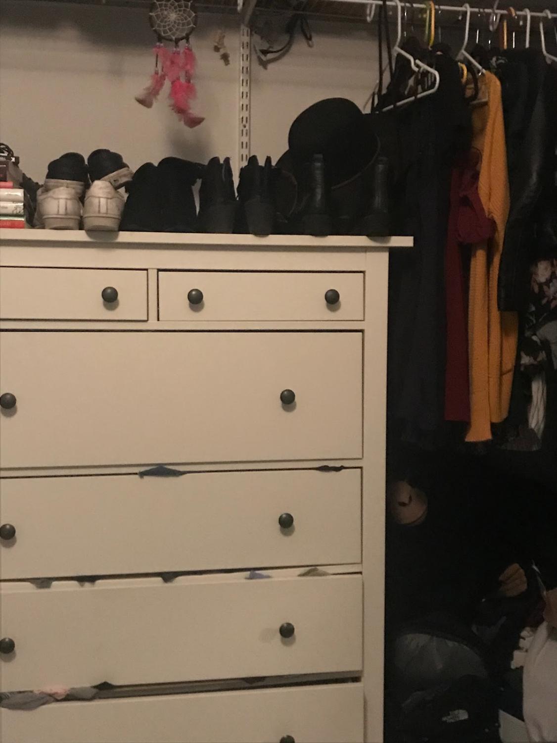 This photo represents the choices being made when picking out clothes to wear and shows the diversity in fashion between different peoples closets. It also shows how individuals have their own personal aesthetics.
