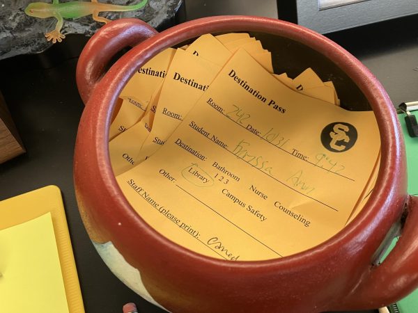 A bowl holds used destination passes in the library